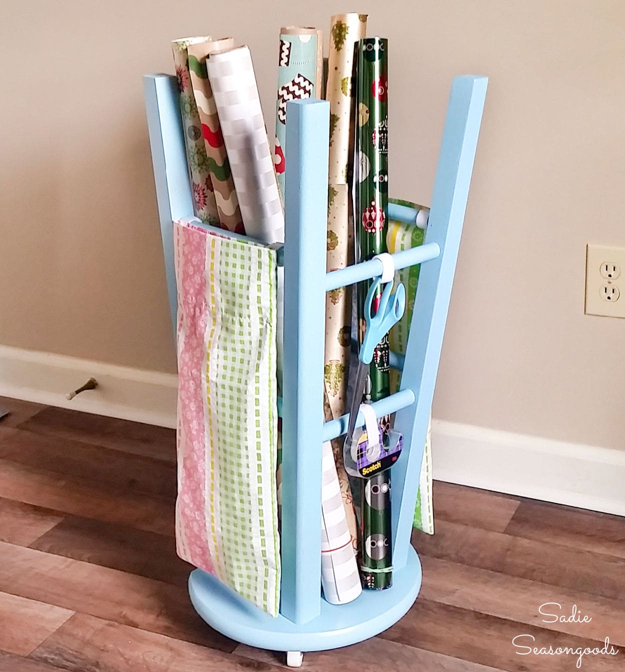 Vertical Wrapping Paper Storage from a Wood Counter Stool